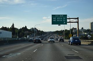 NE 45th Street becomes part of SR 513 at University Village. SR 513 is a 3.35 mile long spur northeast from SR 520 to NE 65th Street at Warren G. Magnuson Park.