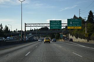 Exit 171 also provides access to NE 73rd Street ahead of Roosevelt Way south and 12th Avenue north. Exit 172 for NE 85th Street west to SR 99 (Aurora Avenue) follows in one half mile.