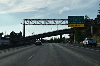 Exit 172 leaves Interstate 5 north at the NE 80th Street overpass. SR 99 (Aurora Avenue) travels 12 blocks to the west between Green Lake and North Park.