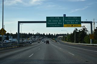 Exit 174 with NE 130th Street and Roosevelt Way (former SR 513) follows in 1.25 miles.