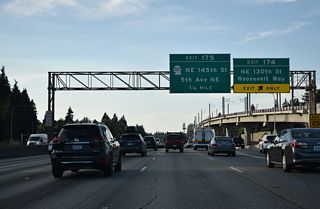 NE 130th Street extends west from Roosevelt Way and Exit 174 to Haller Lake and Broadview in north Seattle. Roosevelt Way connects NE 130th Street with NE 125th Street east to Pinehurst and Lake City. The east to west route was a part of SR 513 until 1991 (AARoads Wiki, 2023).