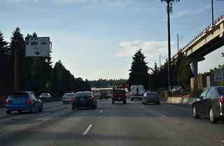 The elevated Sound Transit light rail accompanies Interstate 5 north to Lynwood.