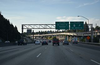 A modified diamond interchange joins I-5 with SR 523 (NE 145th Street) at the Seattle and Shoreline city line. SR 523 straddles the city limits along NE 145th Street for 2.45 miles between SR 99 (Aurora Avenue) and SR 522 (Lake City Way) at Kenwood.