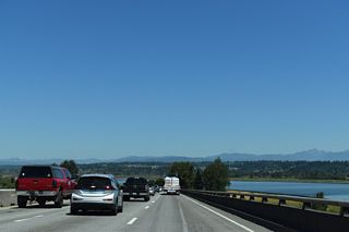 Northbound Interstate 5 spans the Snohomish River with three general travel lanes and an HOV lane.