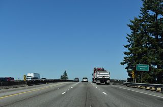 I-5 crosses Steamboat Slough and the Marysville city line ahead of a wye interchange adding traffic from SR 529 north.