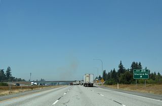 Milltown Road stems east from Pioneer Highway (old SR 530) to become Starbird Road at Pacific Highway (old U.S. 99) adjacent to Exit 218. Starbird Road continues east and then south through rural areas into Snohomish County.
