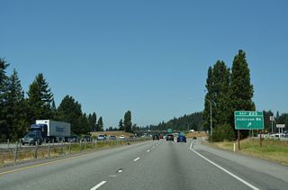 Cloverdale Road continues alongside Interstate 5 north to a roundabout with  Anderson Road adjacent to Exit 225 and beyond to Blodgett Road. Old Highway 99 S north to S 2nd Street leads to the Skagit County Fairgrounds.
