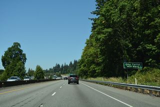 Constructed in the mid-1950s, a barrier median separates the four lane freeway where Interstate 5 passes the Mount Vernon Vernon city center.