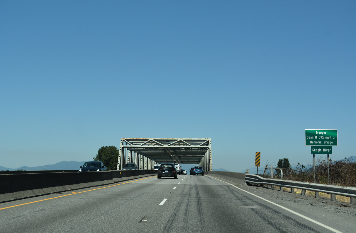 Leaving Mount Vernon and entering the city of Burlington, Interstate 5 crosses the Skagit River north over the Trooper Sean M. O'Connell, Jr. Memorial Bridge.