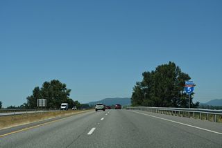 Interstate 5 passes over a BNSF Railroad beyond this north confirming marker.