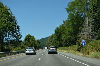 The speed limit reduces to 60 miles per hour along Interstate 5 north of Exit 242.