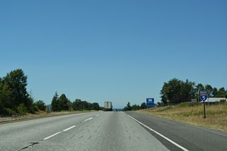 A wye interchange brings motorists onto Interstate 5 north from Maplewood Avenue (former U.S. 99). Pacific Highway continues old U.S. 99 alongside the freeway to Ferndale.