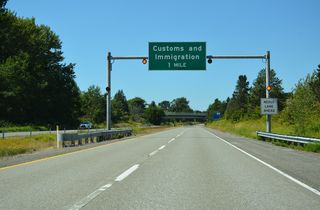 One mile ahead of the customs and immigration station at the north end of Interstate 5.
