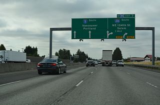 Guide signs for Exit 7 formerly referenced the connections from I-205 to SR 14 east to Camas and Interstate 84 east to Hood River. The Oregon capital city is along the continuation of I-5 south from Tualatin.