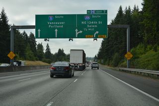 I-5/205 part ways at a wye interchange (Exit 7) and the census designated place of Salmon Creek. Interstate 5 briefly reduces to four overall lanes at the adjacent half diamond interchange with NE 134th Street.