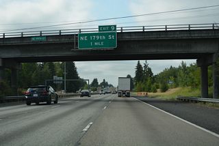 The diamond interchange (Exit 9) with NE 179th Street at Baker serves the adjacent Clark County Fairgrounds. NE 179th Street travels east to the census designated place of Meadow Glade.