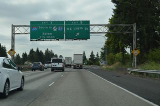 Interstate 205 branches southeast from I-5, 1.5 miles south of Exit 7 / NE 179th Street. Completed in Washington by 1983, Interstate 205 travels 10.57 miles south to the Glenn Jackson Bridge over the Columbia River.