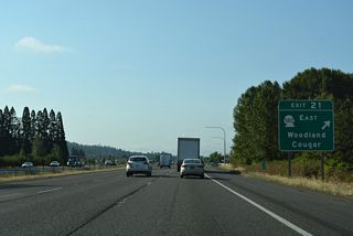 A split diamond interchange at Exit 21 joins Interstate 5 with the west end of SR 503 in Woodland. SR 503 is a 54.11 mile long loop south to SR 500 at Vancouver.