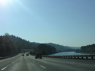 The roadways for Interstate 5 separate at Martin Bluff. The freeway proceeds southeast along Martin Slough across from Martin Island.