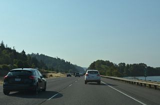 The roadway split accommodates the BNSF Railroad lining the median of Interstate 5 along Martin Slough.