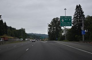 SR 432 (Tennant Way) west to SR 433 leads south to U.S. 30 in Rainier, Oregon. The bridge across the Columbia River opened in 1930 and was tolled until 1965 (Bozanich, n.d.-d).