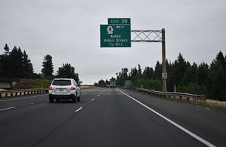 SR 4 heads east from the Kelso city center via Allen Street to end at Exit 39 near Three Rivers Mall. Decommissioned in 1968 (Bozanich, n.d.-a), SR 4 replaced U.S. 830 west from Kelso to U.S. 101 at Johnsons Landing. U.S. 830 east joined U.S. 99 south from Kelso to Vancouver. The original alignment through Kelso used Pacific Avenue south to Ash Street east to Grade Street south.