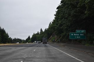 Exit 40 joins I-5 with Kelso Avenue (former SR 431) and Holcomb Road, the east side frontage road. SR 431 followed Kelso Avenue south to Pacific Avenue and SR 4 (Cowlitz Way) at the Kelso city center. The state route was dropped in 1992 (AARoads Wiki, 2023).