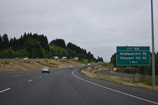 One mile north of the diamond interchange (Exit 46) with Headquarters Road on Interstate 5 south.