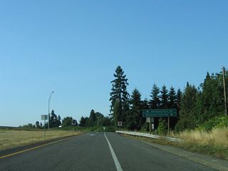 Taking Exit 46 to Headquarters Road. Pleasant Hill Road travels nearby and loops south to Pleasant Hill before crossing under Interstate 5 near Exit 42.