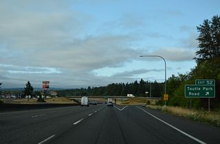 Exit 52 departs Interstate 5 south for Barnes Drive north and Old Pacific Highway south. Toutle Park Road spurs east along the Toutle River.