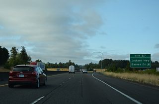 Barnes Drive leads southwest from Exit 57 as part of Old U.S. 99 toward the Cowlitz River.