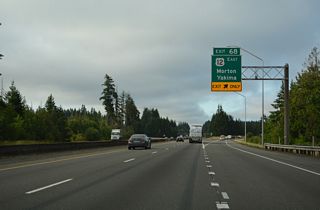 Morton is 30 miles east from Exit 68. 137 miles away, Yakima lies beyond the Cascade crest in the dry side of Washington State, where annual rainfall totals are a fraction of those of the west side. U.S. 12 overtook what was U.S. 410 from near Naches east to Idaho in 1967.