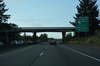 Exit 77 leaves I-5/U.S. 12 south after the West Street overpass. SR 6 runs 51.37 miles west to Rainbow Falls State Park, Pe Ell, and around P and E Ridge to U.S. 101 at Raymond.