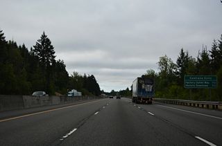 Old U.S. 99 angles southeast from the Thurston County line along Harrison Avenue through unincorporated Fords Prairie to meet I-5/U.S. 12 at the first of two exits within the city of Centralia. U.S. 99 shifted onto the eventual I-5, from Exits 79 to 102, in the mid 1950s (Bozanich, n.d.).