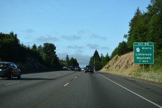 SR 121 returns to Interstate 5 near Maytown paralleling the Tacoma Eastern Railroad. The two routes converge at a folded diamond interchange (Exit 95) due to the adjacent railroad line.