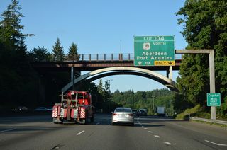 U.S. 101 heads west from Exit 104 to West Olympia and Mud Lake, separating with SR 8 in 5.7 miles. SR 8 joins Olympia with Aberdeen via U.S. 12, a route that was originally signed as U.S. 410.