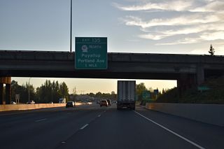 SR 167 (River Road / E 28th Street) follows the Puyallup River northwest from Puyallup to Interstate 5 at Exit 135. The state route represents the historic alignment of U.S. 410.