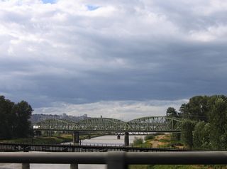 Paralleling Interstate 5 to the north across the Puyallup are the BNSF Railroad bridge, the Fishing Wars Memorial Bridge along Historic U.S. 99, and the Tacoma Rail bridge.