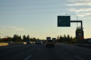 Exit 137 leaves I-5 south for SR 99 (54th Avenue E) north. 54th Avenue south connects the freeway with 20th Street E to Milton and Valley Road southeast to Edgewood. 54th Avenue north leads SR 99 from I-5 to the original U.S. 99 route along Pacific Highway east.
