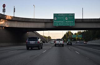 SR 18, a 28.41 mile long route, converges with I-5 at a cloverleaf interchange (Exit 142) in Federal Way.