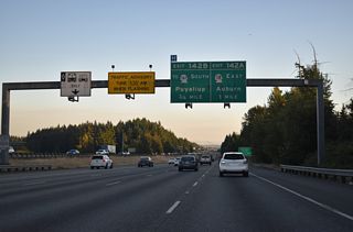 Exit 142 B departs in 0.75 miles mile for SR 18 (S 348th Street) west to SR 161 (16th Avenue S) and SR 99.