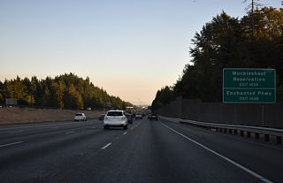 There is no direct access from I-5 to nearby SR 161 (Enchanted Parkway). Instead motorists are directed onto SR 18 (S 348th Street) west to SR 161. SR 161 is a 36.25 mile long highway that leads south from SR 18 to the Six Flags Wild Waves theme park, Milton, Edgeway and Puyallup.
