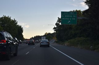 S 200th Street stems west from the southbound I-5 ramps at Exit 151 to North Hill in Des Moines. Military Road shifts to the east side of the freeway toward western reaches of Kent.