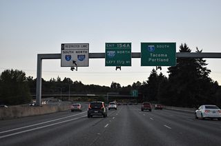 Leaving the half diamond interchange with Interurban Avenue, I-5 converges with SR 599 south, 1.50 miles out from the cloverstack interchange with I-405 north and SR 518 west.