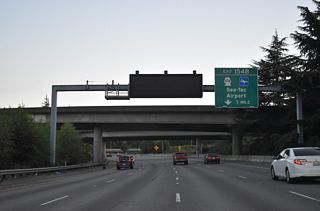 SR 518 extends west along a freeway from Interstate 405 to Seattle-Tacoma International Airport (SEA) and Burien at SR 509.