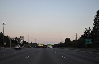 SR 518 extends 3.42 miles west along a freeway to SR 509 at SW 148th Street in Burien. Burien is a city along Puget Sound.