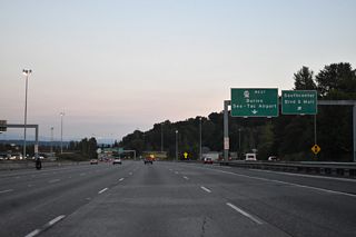 Southcenter Boulevard parallels Interstate 405 east to 61st Avenue for access to the mall and SW Grady Way in Renton. Extending westward from Southcenter Boulevard, S 154th Street, the original alignment of SR 518, leads to Five Corners and Sunnydale in Burien.