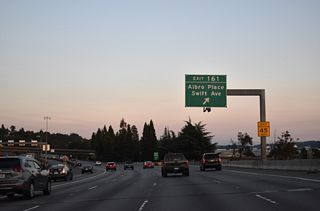 Exit 161 leads directly to Albro Place at Corglat Drive. Albro Place connects Interstate 5 with Ellis Avenue at Georgetown to the west and Swift Avenue near Holly Park on the adjacent hillside.