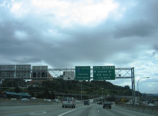 The Interstate 5 mainline next meets Exit 163 B to Forest Avenue and 6th Avenue S, and Exit 163 A to the West Seattle Bridge / Spokane Street Viaduct at the Duwamish Industrial area.