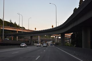 Interstate 5 south at the multi level interchange (Exit 163 A) with the Spokane Street Viaduct west and Columbian Way east.